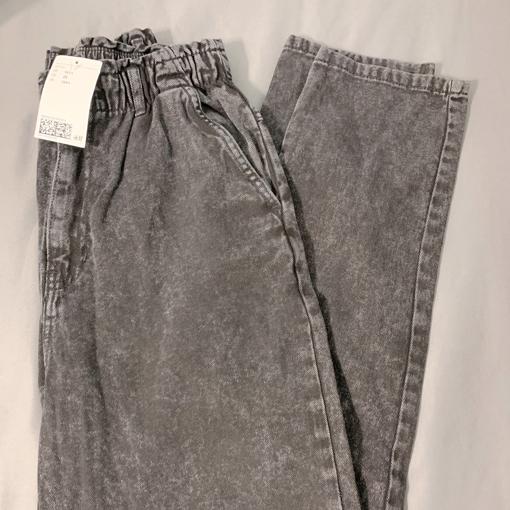 Black jeans with tags